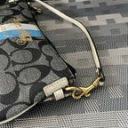 COACH SIGNATURE HERITAGE STRIPE POUCH WRISLET