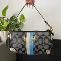 COACH SIGNATURE HERITAGE STRIPE POUCH WRISLET